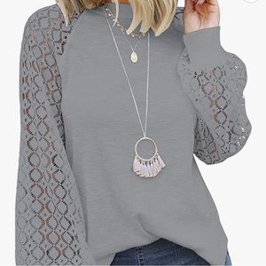 Woman’s XL gray ballon sleeve top with lace arms. NWT never worn
